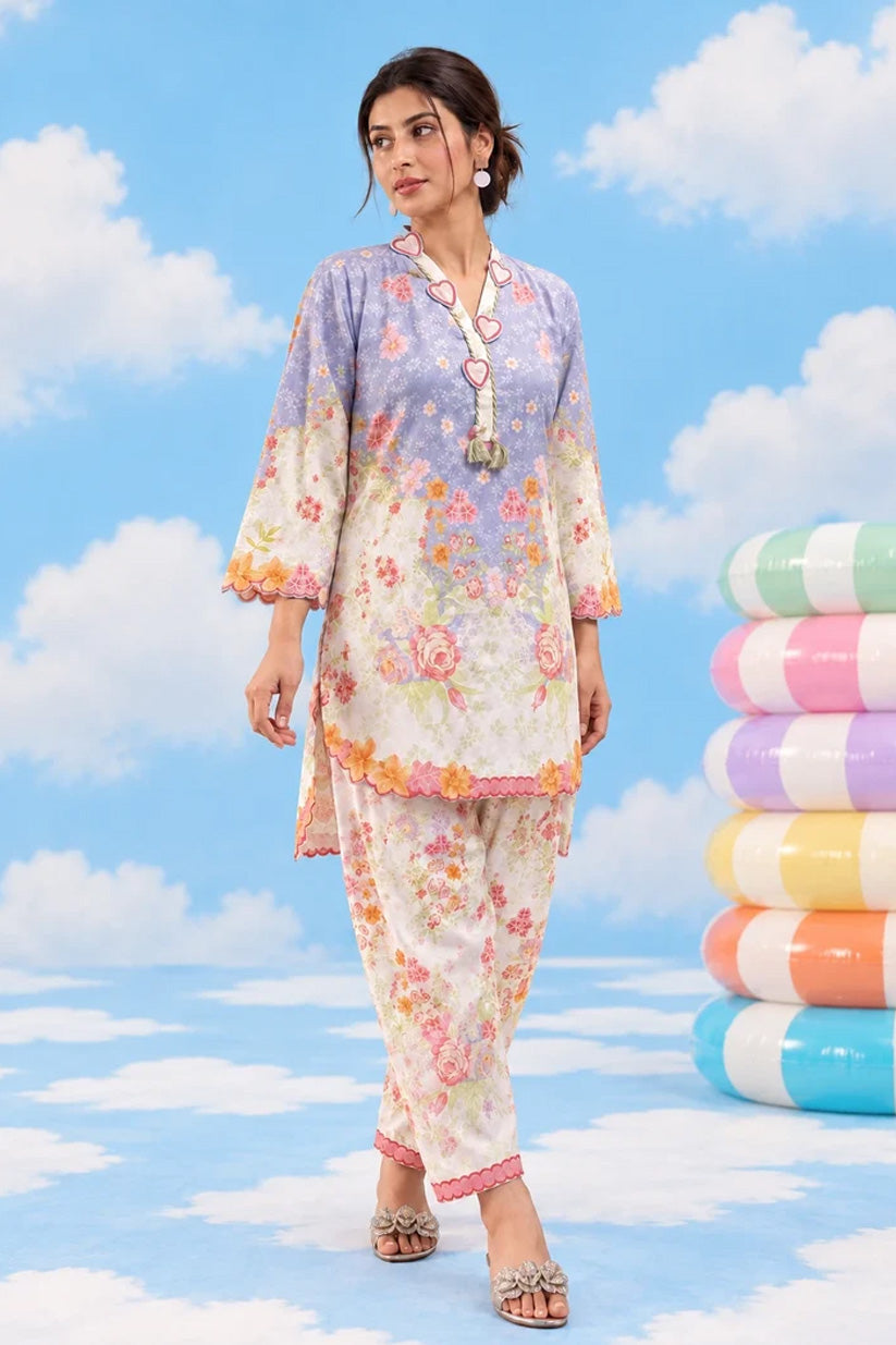 Powder blue floral print lawn suit walking view – Dhaga Vibe design