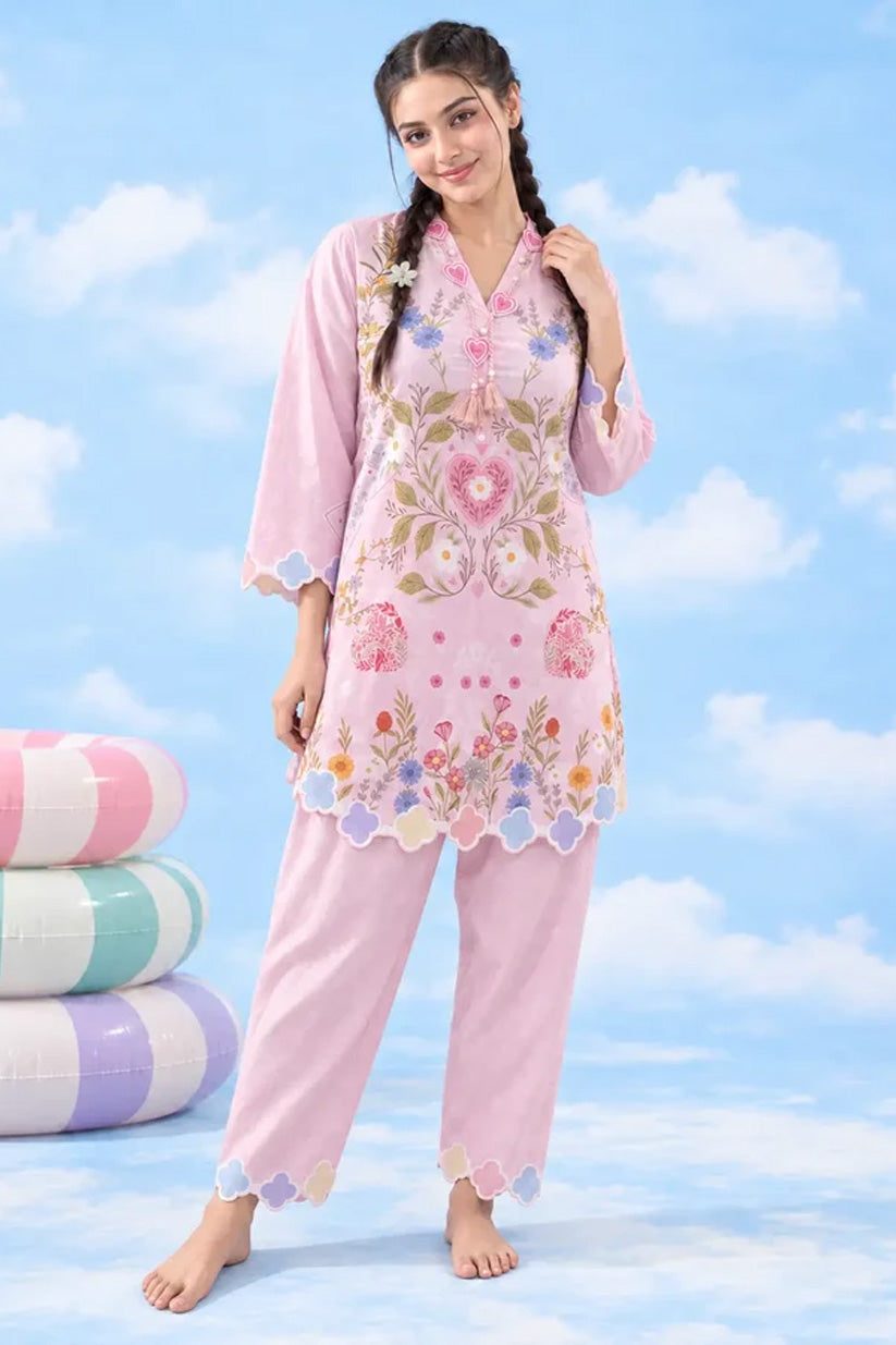 Full-length editorial view of pink printed lawn co-ord