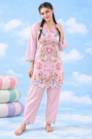 Full-length editorial view of pink printed lawn co-ord