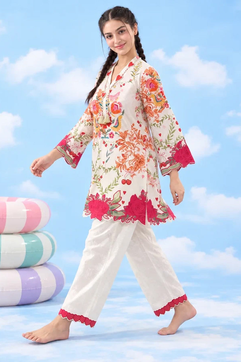Full-length walking pose of ivory floral lawn co-ord