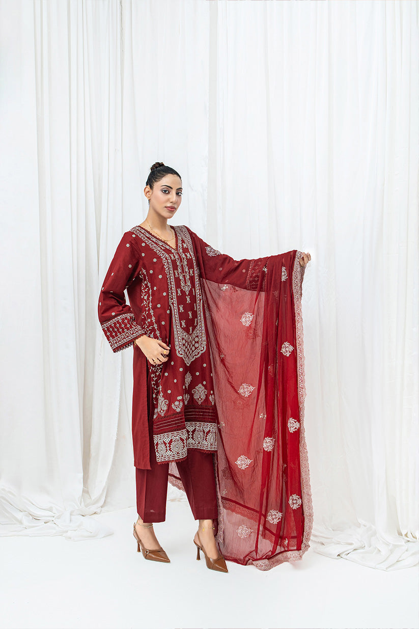 Close up of thread and sequin embroidery on maroon lawn suit HS280