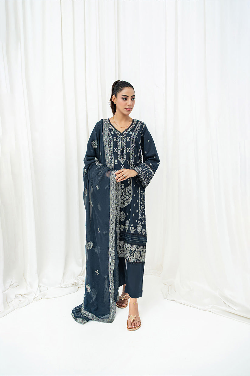 Woman wearing navy blue embroidered 3 piece lawn suit with chiffon dupatta HS280